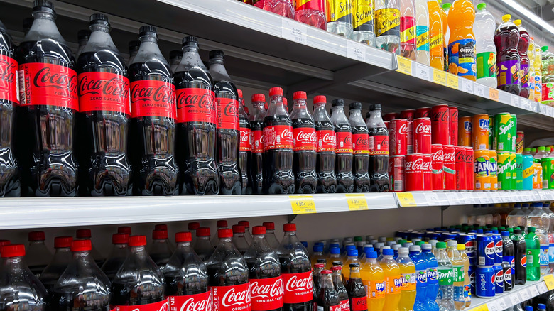 Coca Cola items on shelf
