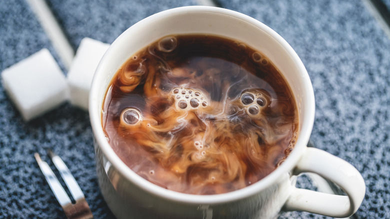 Cup of coffee with cream