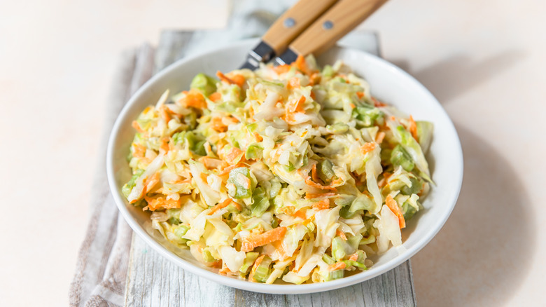 coleslaw in a white bowl