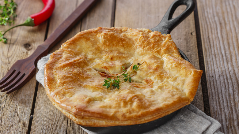 Chicken pot pie in a cast iron skillet.