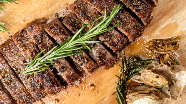 Delicious seasoned sirloin on cutting board