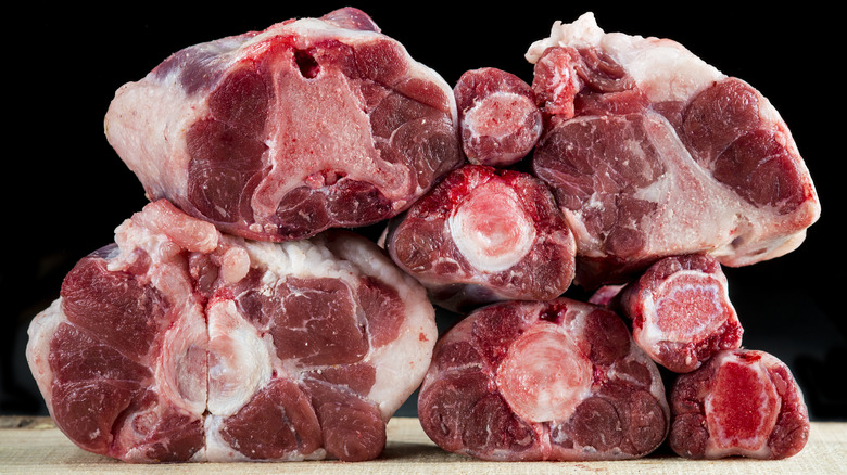 Raw oxtails on a cutting board