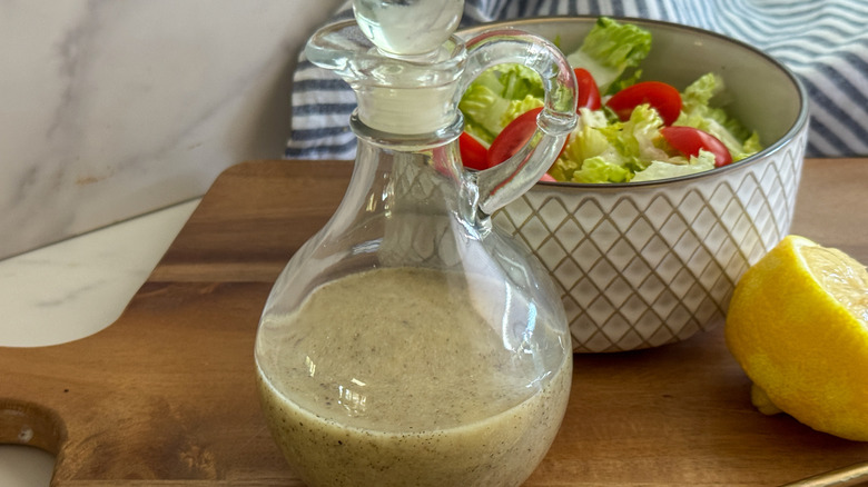 dressing in cruet with salad