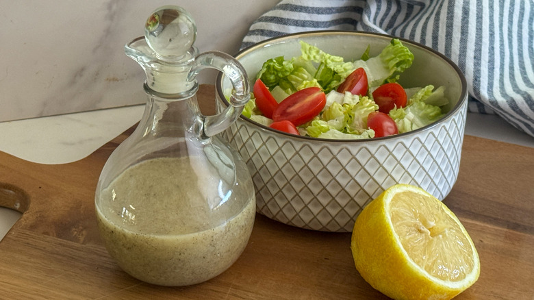 dressing in cruet with salad