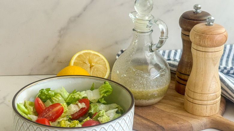 salad with dressing in cruet