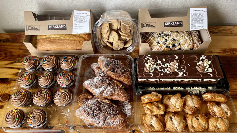 Various baked desserts form Costco on a wooden table