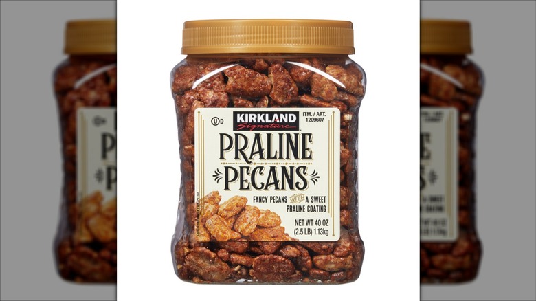 Container of praline pecans by Kirkland.