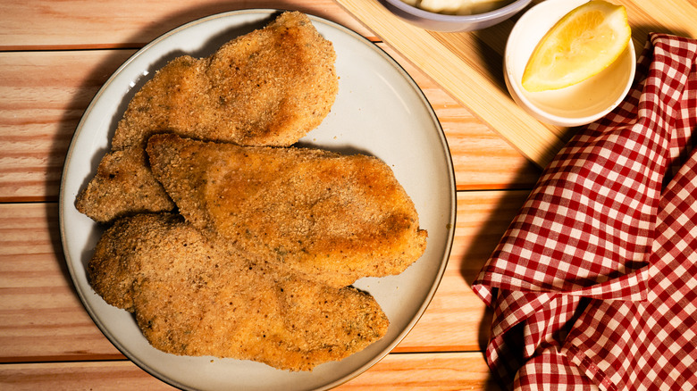 Breaded chicken fillets on a plate