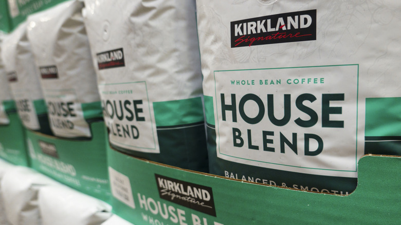 A row of Kirkland whole bean coffee at Costco.