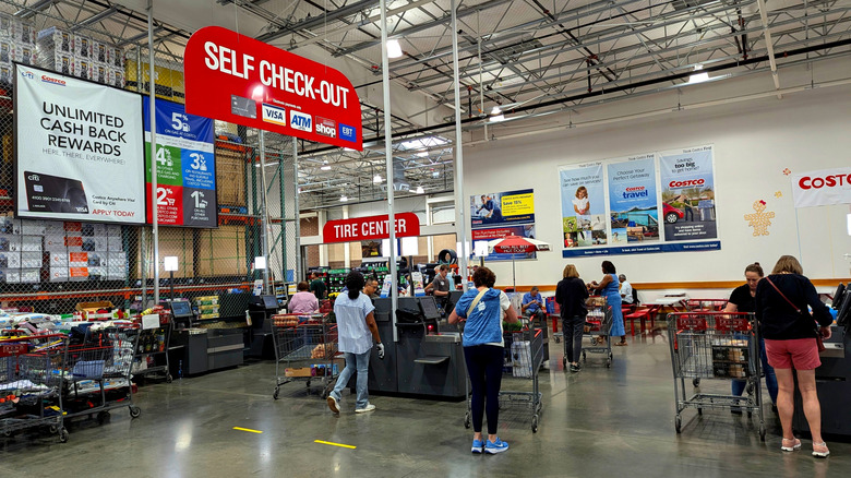 Costco customers near the registers