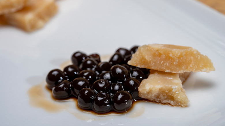 Balsamic pearls on a plate