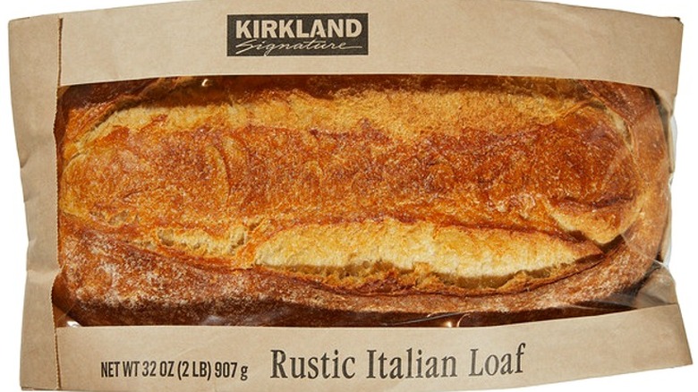 Kirkland Signature Rustic Italian Loaf in a brown package with a clear plastic window to showcase the bread.