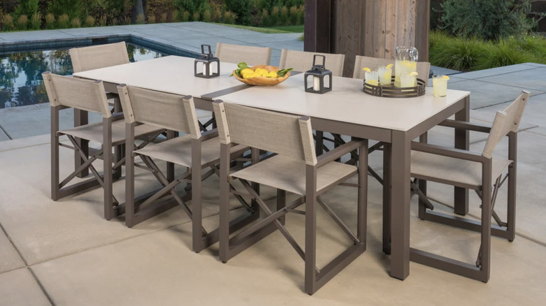 The SunVilla Anchor 9-piece Outdoor Patio Dining Set with Folding Chairs from Costco