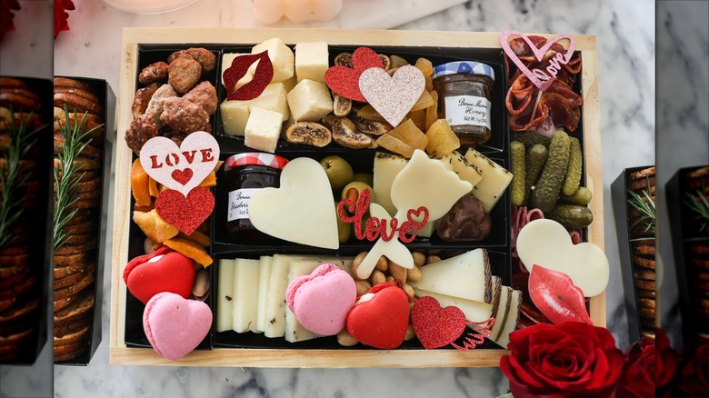 Luxe Bites Classic Charcuterie Board filled with various cheeses and snacks.