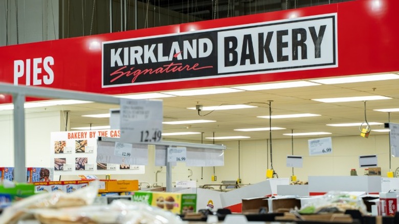 A Kirkland Signature Bakery sign inside of a Costco store.