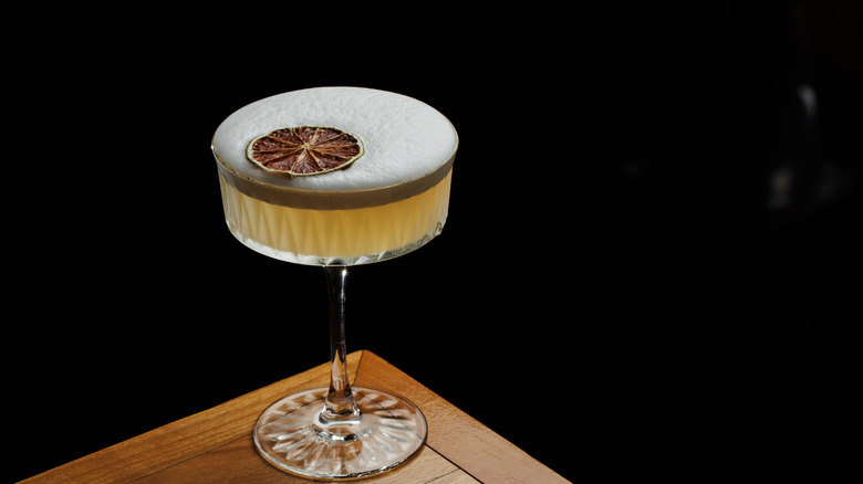 a cocktail in a vintage coupe glass