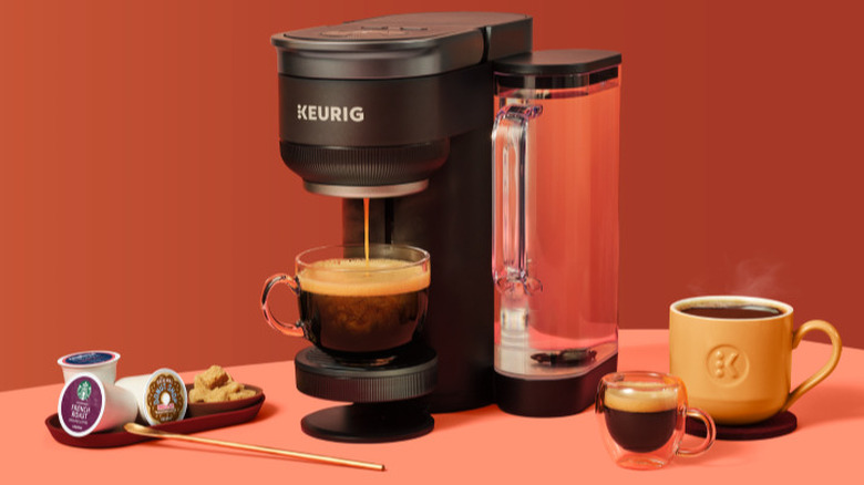 Keurig single serve coffee maker pouring one cup of coffee