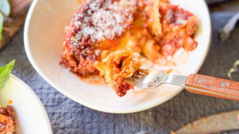 Cottage cheese lasagna bite on fork close up