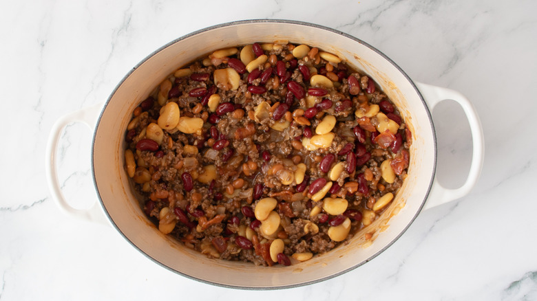 ground beef and mixed beans in a white pot