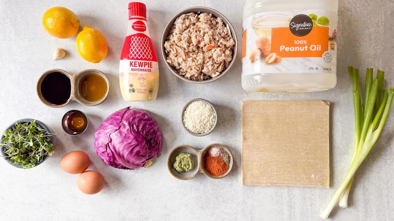 Crab cake egg rolls ingredients on countertop