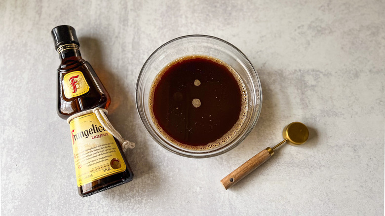 Espresso and Frangelico in bowl with measuring spoon