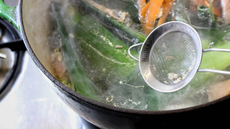 skimming albumin with small sieve