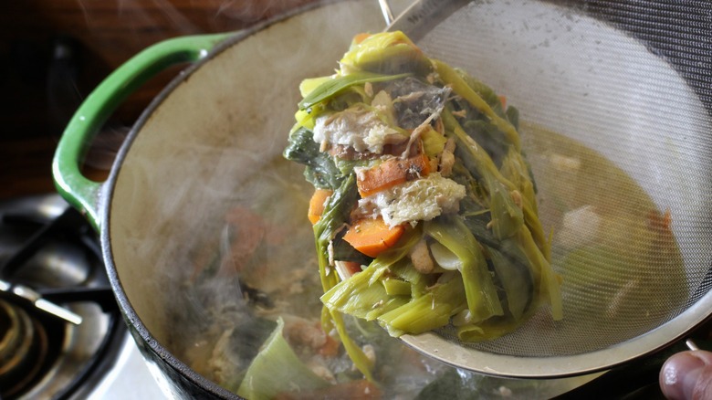 straining solids from broth