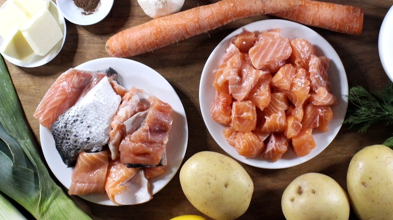 plates of salmon scraps and salmon fillet