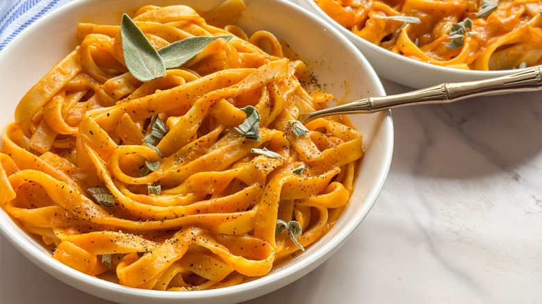 Bowl of pumpkin pasta with sage
