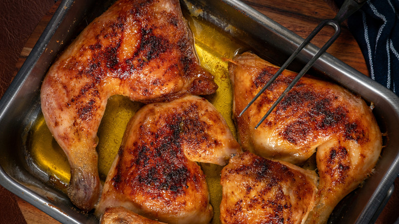 bbq chicken legs covered in a spicy dry rub.