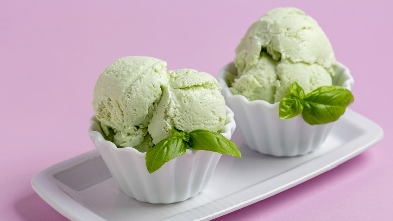Basil ice cream in bowls on a dish