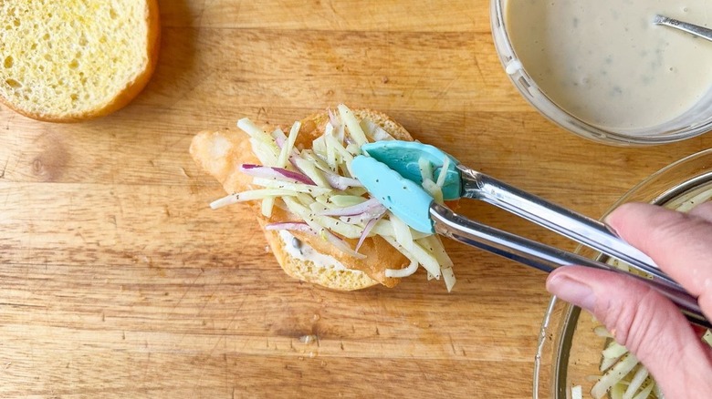 Adding fennel slaw to beer-battered fish sandwich