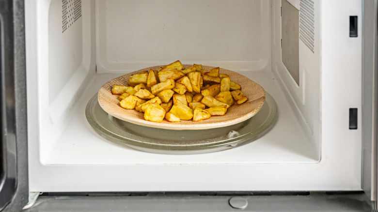 A plate of chips inside the microwave.
