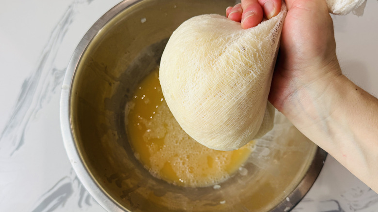 Squeezing excess liquid from latke mixture