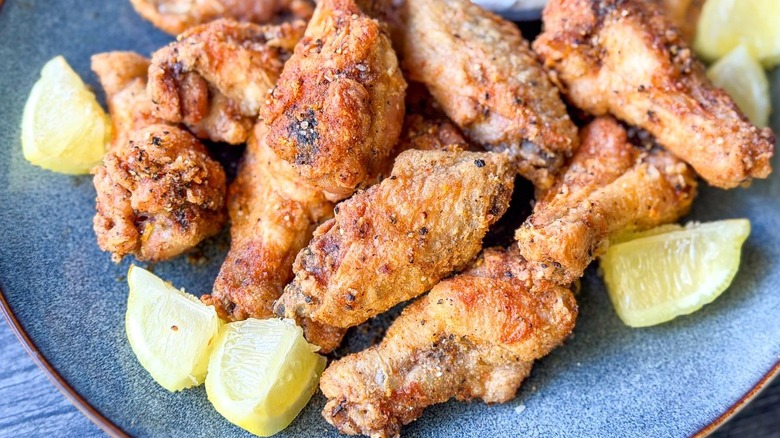 Closeup of crispy lemon pepper chicken wings