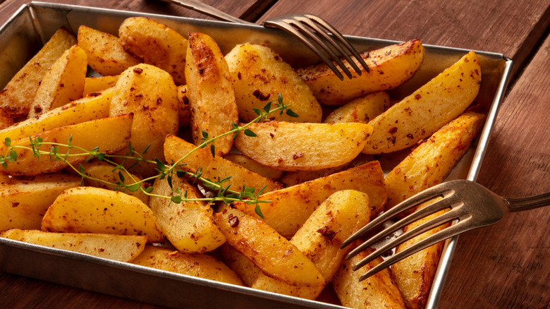 Potato wedges in a baking pan