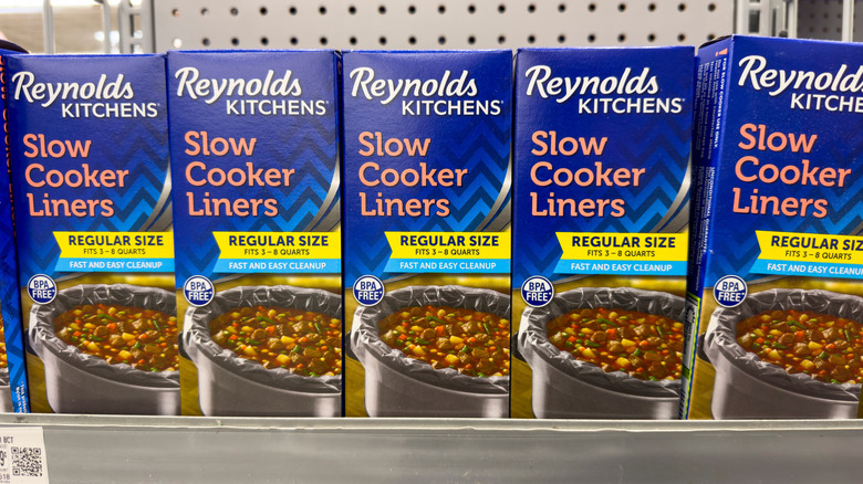 A view of several packages of Reynolds Kitchens slow cooker liners, at the store