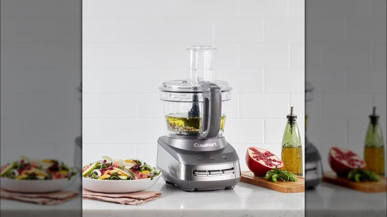 10-cup Cuisinart food processor, with oil and vegetables on the side