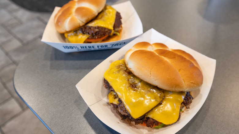 Two ButterBurgers with cheese from a Culver's fast food restaurant
