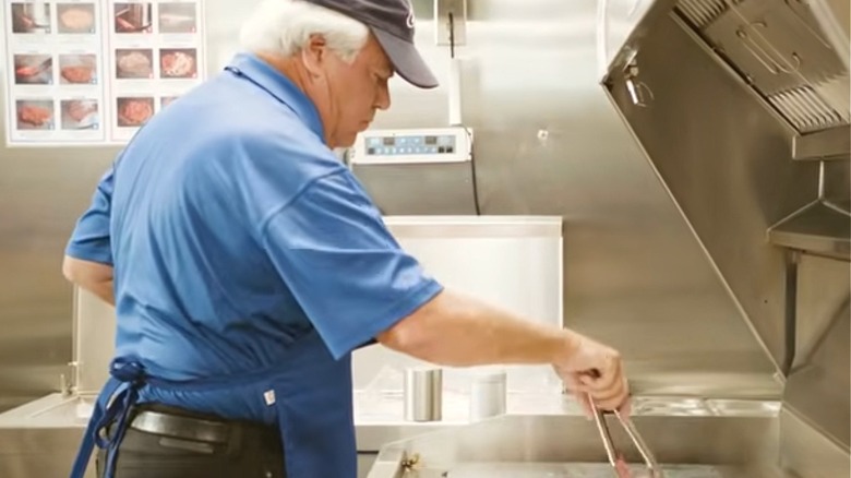 Culver's co-founder Craig Culver manning the grill station