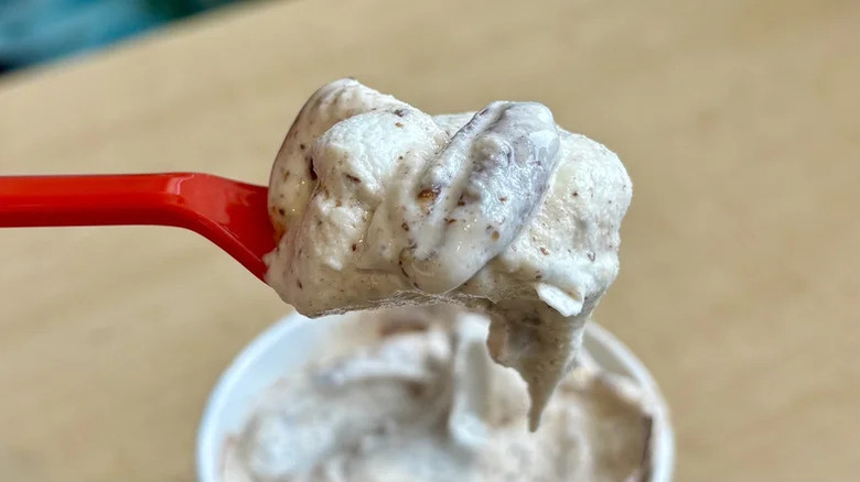 A spoonful of Dairy Queen's Turtle Pecan Blizzard