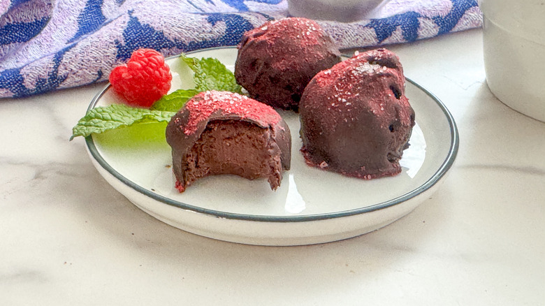 Raspberry chocolate truffles on plate
