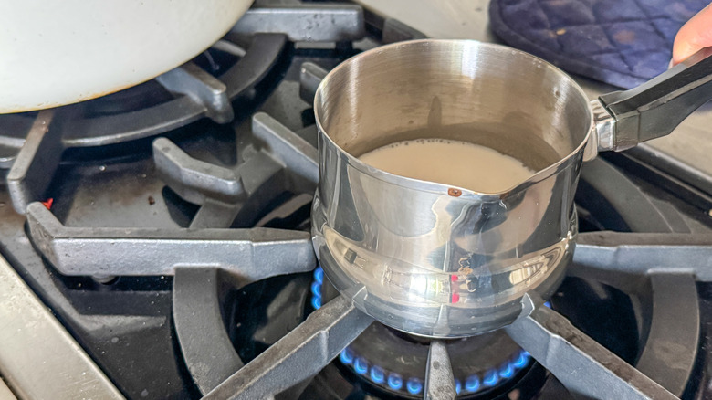 cream in small pot on stove