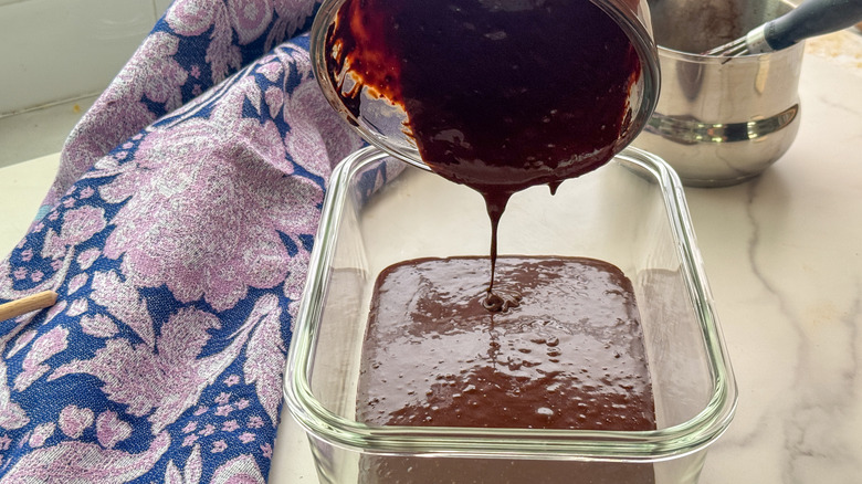 pouring ganache into container
