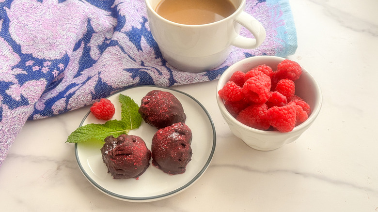 Raspberry chocolate truffles on plate