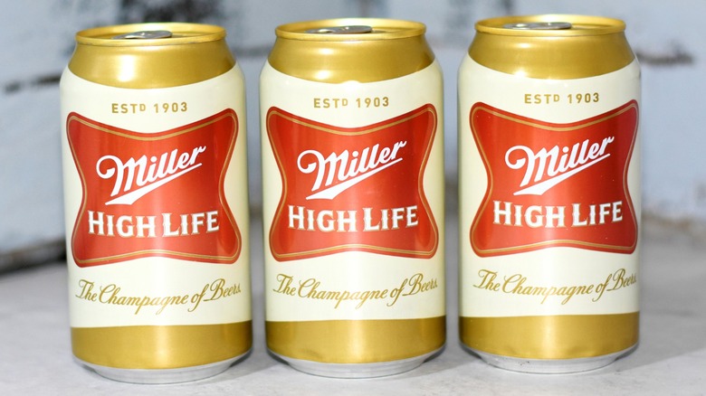 Three cans of Miller High Life