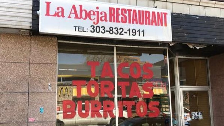 La Abeja restaurant storefront advertises tacos, tortas, and burritos