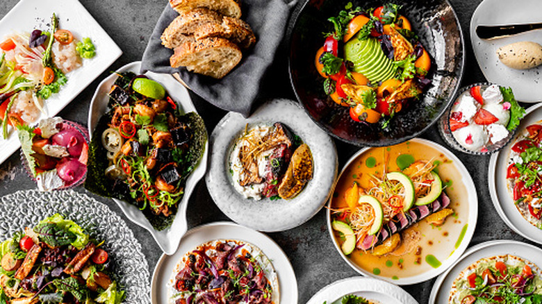A wide variety of dishes displayed on a table