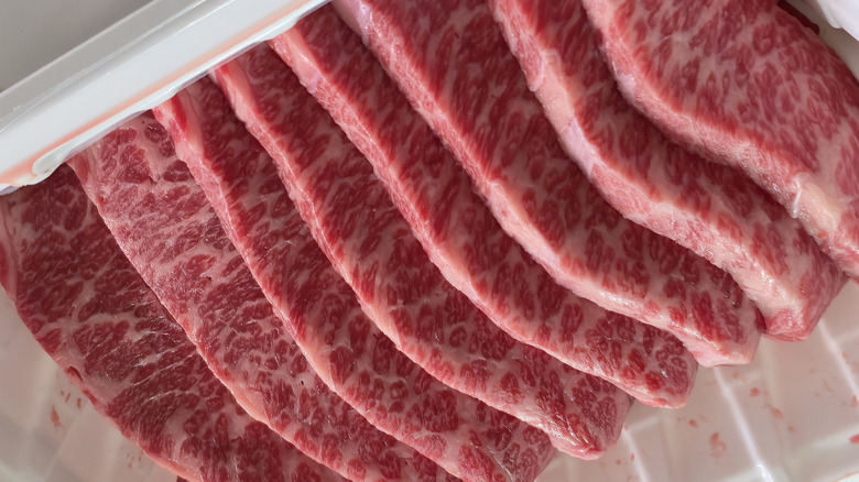 Strips of marbled wagyu beef