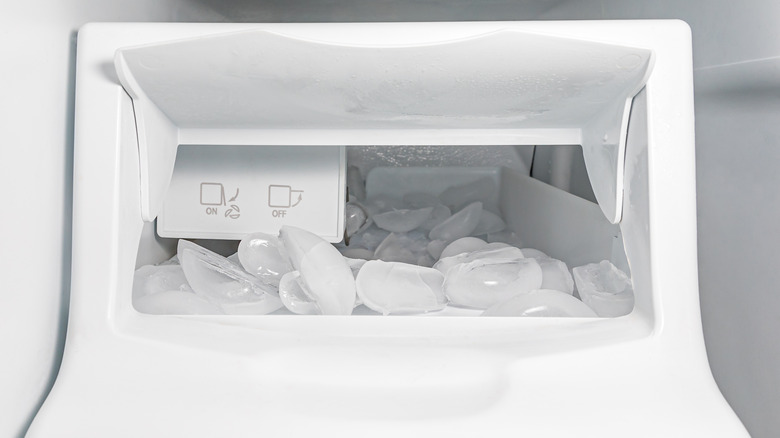 Photo of an in-freezer ice maker full of ice cubes